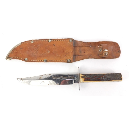 690 - Horn handled knife with leather sheath, the blade marked Original Bowie Knife, 25.5cm long