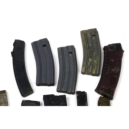 709 - Ten mixed machine gun magazines including AK74 and M16 examples