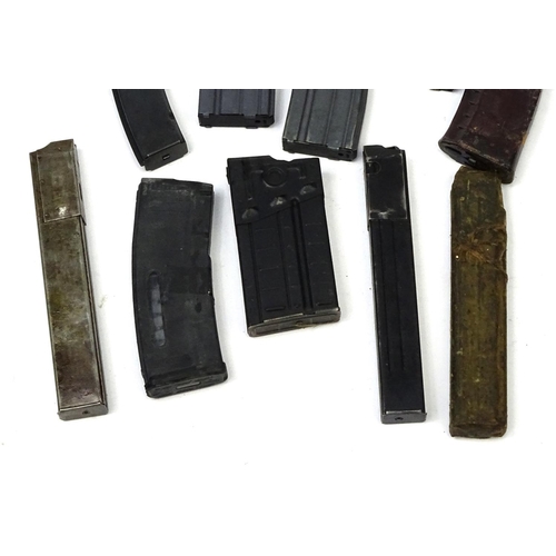 709 - Ten mixed machine gun magazines including AK74 and M16 examples