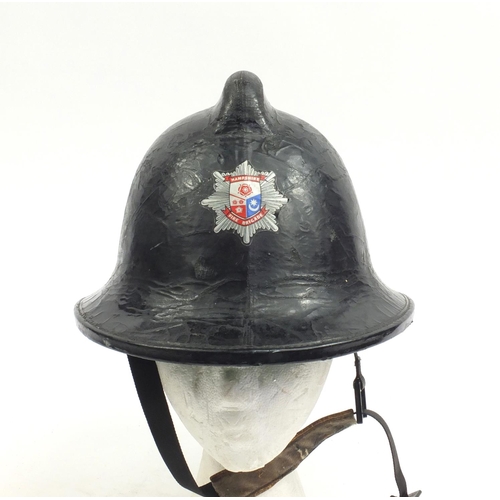 720 - Firemen's helmet with Hampshire fire brigade decal, size small