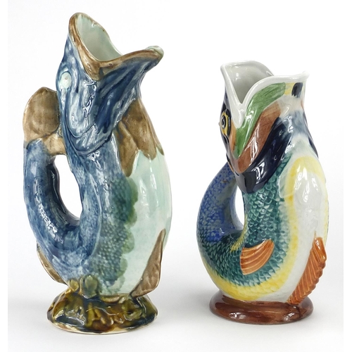 128 - Four fish spill vases together with a pair of Hummel fish salt and peppers, the vases including a Da... 