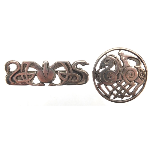 628 - Two Celtic design Scottish silver brooches by Shetland, the largest 6cm wide, approximate weight 28.... 