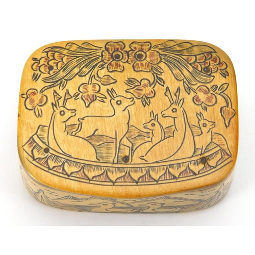 23 - Rectangular horn Scrimshaw snuff box decorated with animals and flowers, 2.5cm H x 5.6cm W x 4.3cm D