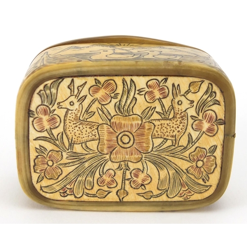 23 - Rectangular horn Scrimshaw snuff box decorated with animals and flowers, 2.5cm H x 5.6cm W x 4.3cm D