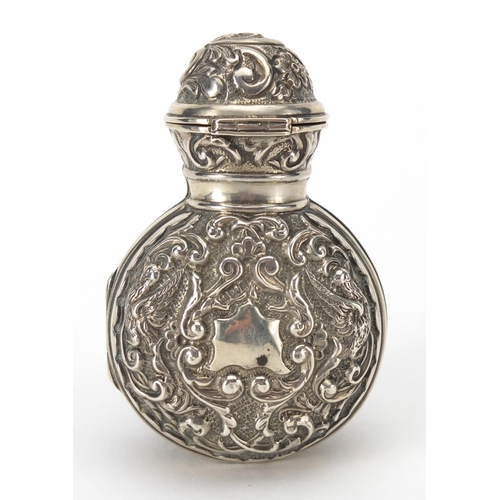 41 - Miniature silver cased green glass scent bottle embossed with birds and foliage, Birmingham 1901, 8.... 