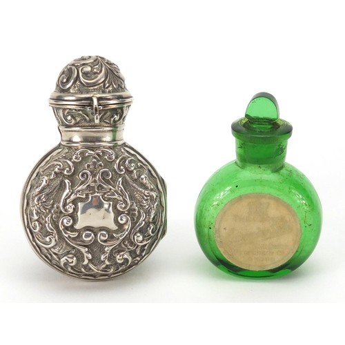 41 - Miniature silver cased green glass scent bottle embossed with birds and foliage, Birmingham 1901, 8.... 