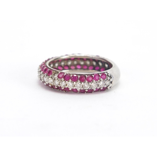 695 - Unmarked white metal Diamond and Ruby half eternity ring, size P, approximate weight 4.5g