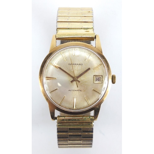 817 - Gentleman's 9ct gold Garrard automatic wristwatch, 3.4cm in diameter excluding the crown