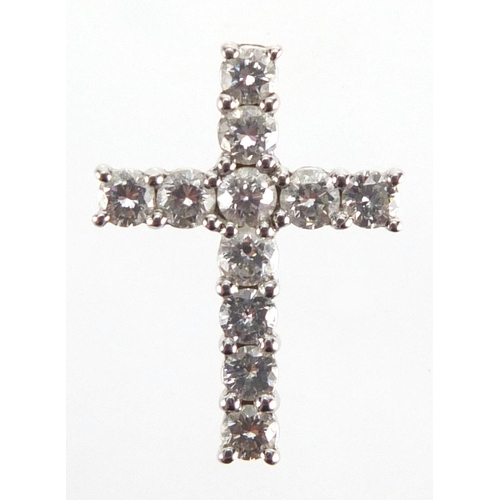 742 - 18ct white gold Diamond cross pendant, 1.5cm in length, approximate weight 1.2g