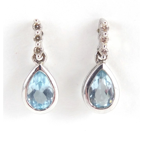 689 - 9ct white gold tear drop Aquamarine and Diamond necklace, with matching earrings, the necklace 42cm ... 