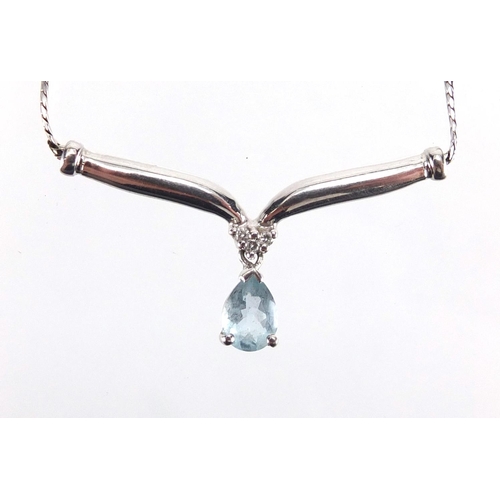 689 - 9ct white gold tear drop Aquamarine and Diamond necklace, with matching earrings, the necklace 42cm ... 