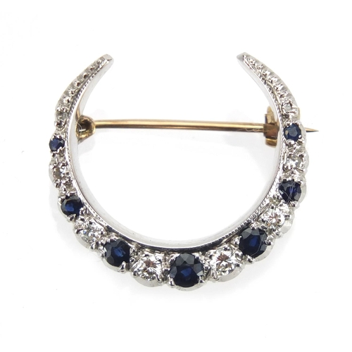 718 - 9ct gold Diamond and Sapphire moon crest brooch, marked FRS Ltd, 2.5cm in length, approximate weight... 