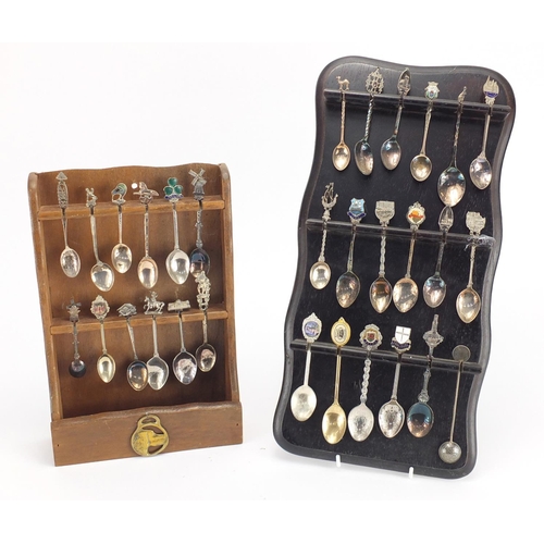 532 - Collection of silver plated souvenir teaspoons, with two display stands