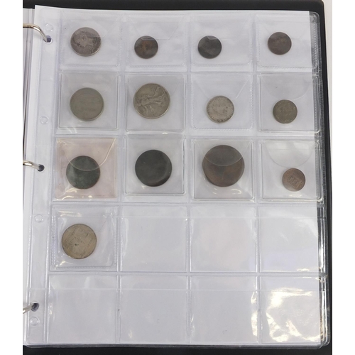 627 - Album of World coins including silver three penny bits and Chinese examples