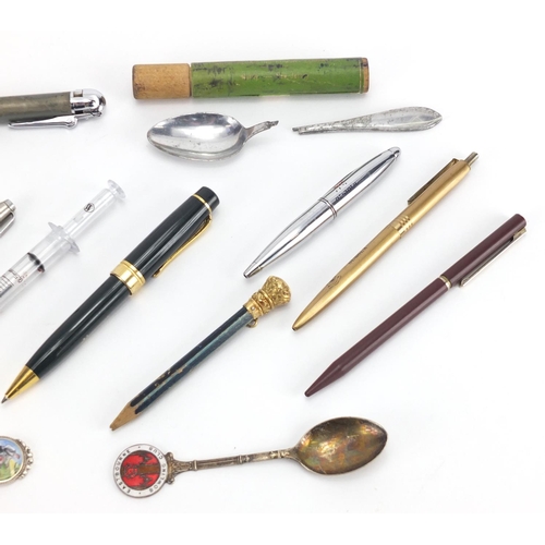 561 - Group of vintage and later pens, including a novelty syringe example and a silver and enamel teaspoo... 