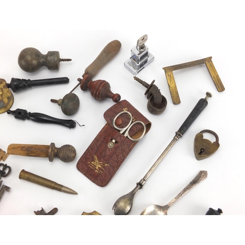 555 - Group of antique and later keys, locks and clock pendulums