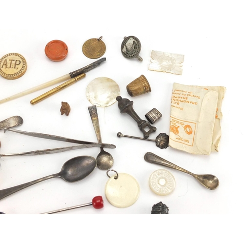 546 - Bag of objects including Georgian and later silver spoons, Mother of Pearl counters and thimbles