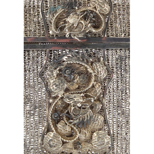 412 - Chinese filigree silver card case, decorated with two dragons and flowers, 8.5cm high x 5.7cm wide, ... 