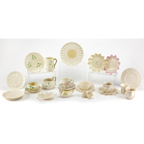 525 - Collection of Belleek porcelain, some early examples including cups, saucers, jug and vases, the lar... 