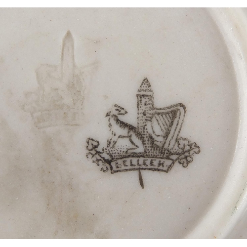 525 - Collection of Belleek porcelain, some early examples including cups, saucers, jug and vases, the lar... 