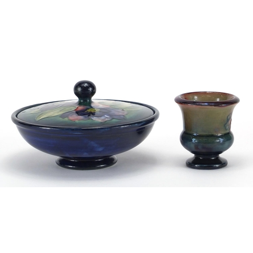 561 - Moorcroft pottery Hibiscus powder bowl and cover, together with a Moorcroft pottery Flambe urn vase,... 