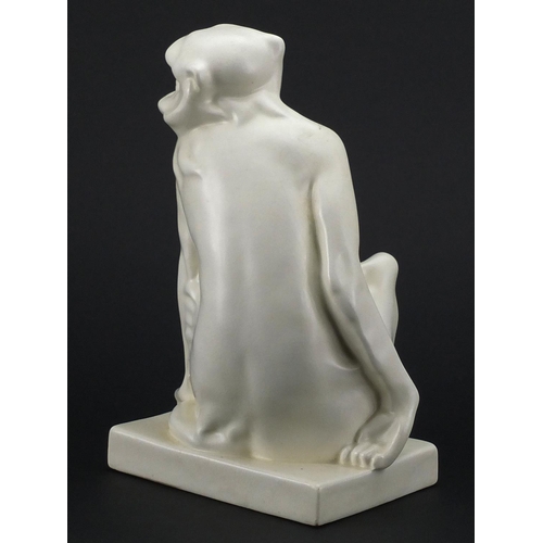 559 - Wedgewood white glazed figure of a monkey by John Skeaping, factory marks to the base, 24cm high