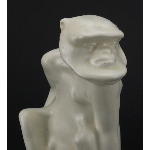 559 - Wedgewood white glazed figure of a monkey by John Skeaping, factory marks to the base, 24cm high