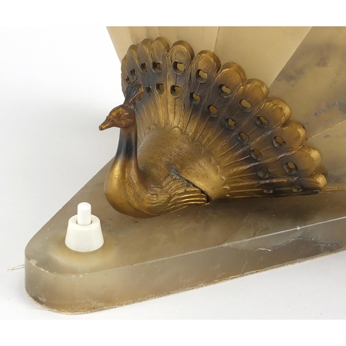 605 - Art Deco onyx and alabaster wall sconce in the form of a peacock, 17cm high