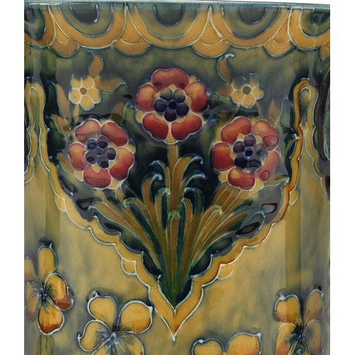 560 - Macintyre Moorcroft pottery tyg, hand painted and tube lined with flowers, factory marks and numbere... 