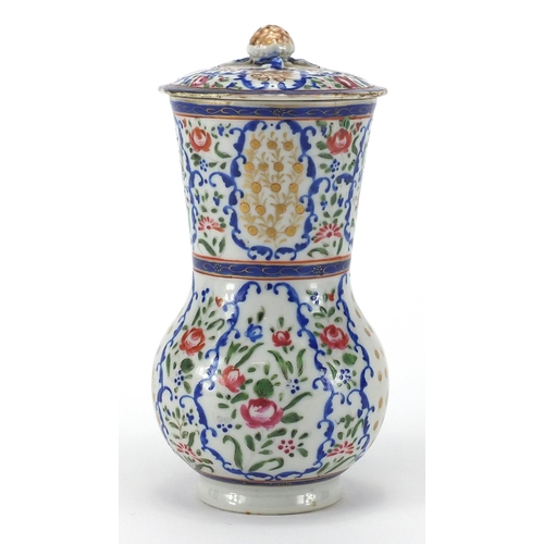 357 - Chinese porcelain strainer, hand painted in the famille rose palette with flowers, 20cm high