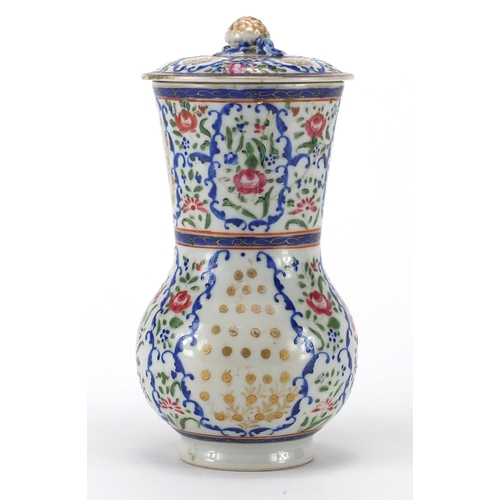 357 - Chinese porcelain strainer, hand painted in the famille rose palette with flowers, 20cm high