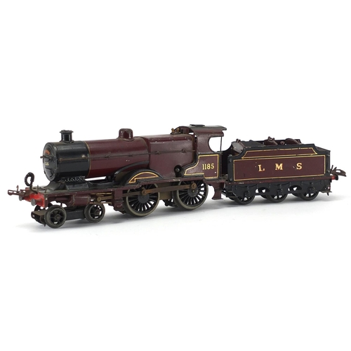 310 - Hornby O gauge clockwork LMS locomotive and tender, numbered 1185