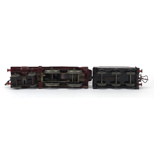 310 - Hornby O gauge clockwork LMS locomotive and tender, numbered 1185