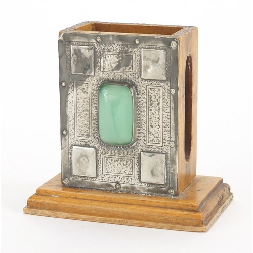 615 - Arts & Crafts matchbox holder, the pewter front inset with cabochon, 7cm high