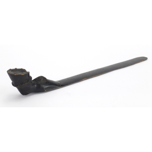 67 - Swiss black forest carved page turner, the handle in the form of a horses hoof, 39.5cm in length