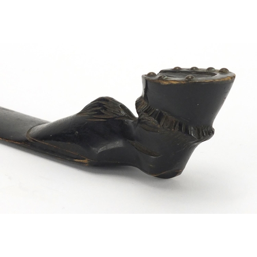 67 - Swiss black forest carved page turner, the handle in the form of a horses hoof, 39.5cm in length