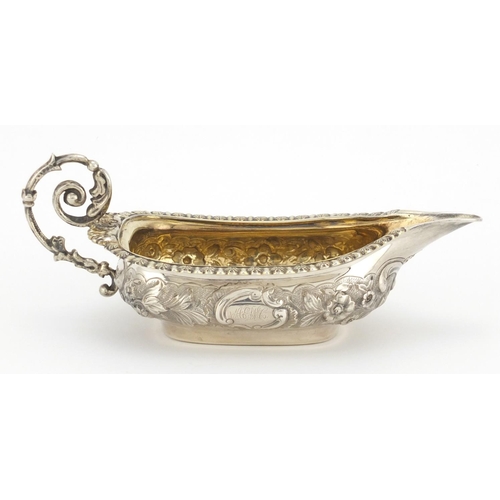 634 - WITHDRAWN - Georgian silver sauce boat with embossed floral decoration and gilt interior, WB London ... 