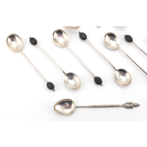 670 - Two sets of six silver spoons and a set of six unmarked silver teaspoons, various hallmarks, the lar... 