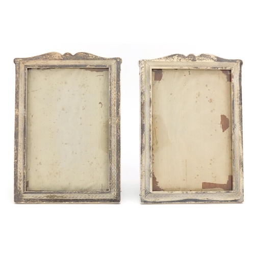 638 - Pair of rectangular silver easel photo frames with engine turned decoration, retailed by J.C. Vicker... 