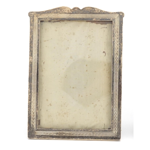 638 - Pair of rectangular silver easel photo frames with engine turned decoration, retailed by J.C. Vicker... 