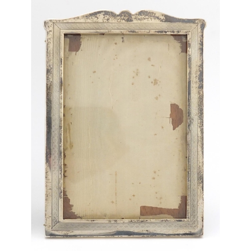 638 - Pair of rectangular silver easel photo frames with engine turned decoration, retailed by J.C. Vicker... 