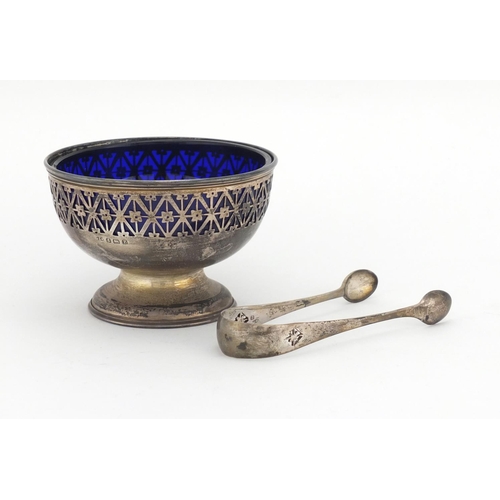 664 - Circular silver sugar bowl with pierced decoration, blue glass liner and matching sugar tongs, D & F... 