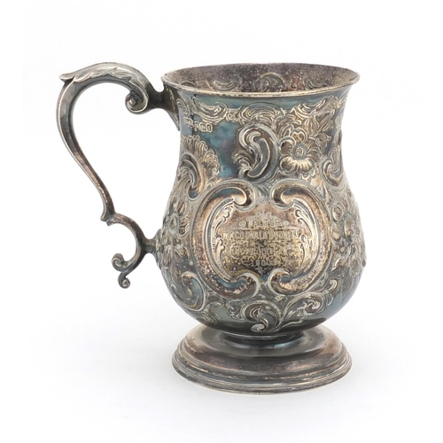 644 - Victorian silver tankard with embossed floral decoration, J.D & S Sheffield 1898, 13.5cm high, appro... 