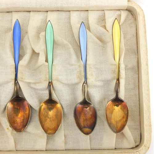 623 - Set of six silver and guilloche enamelled teaspoons, each stamped 925, housed in a Astwood-Dickinson... 