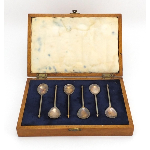 673 - Set of six silver spoons, LWB London 1956, housed in a fitted oak case, each 10cm in length, approxi... 