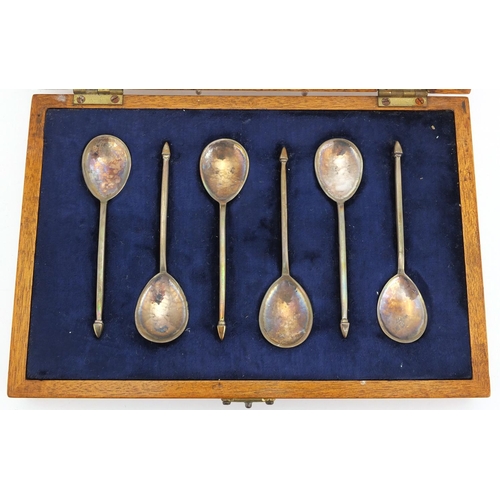 673 - Set of six silver spoons, LWB London 1956, housed in a fitted oak case, each 10cm in length, approxi... 