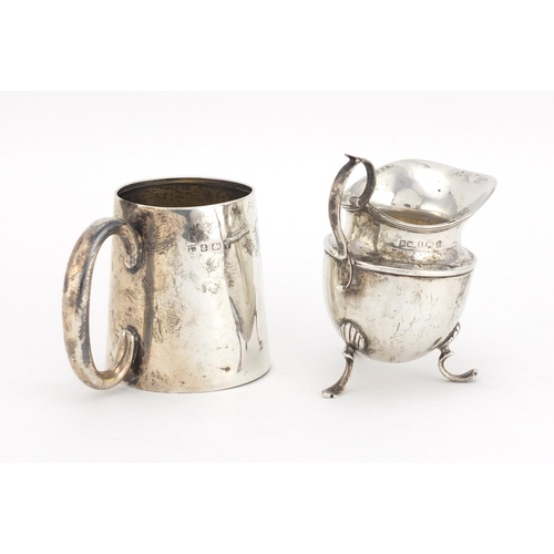 658 - Silver Christening tankard and three footed cream jug, various hallmarks, the largest 8.5cm high, ap... 