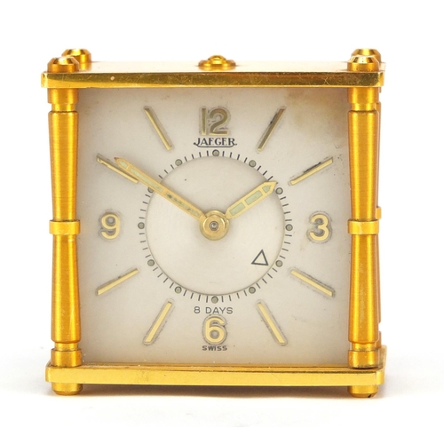 854 - Miniature Jaeger eight day travelling alarm clock, 5.5cm high