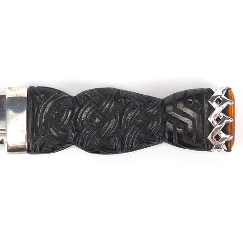97 - Scottish silver mounted Skean Dhu with basket weave design grip and citrine stone end, the silver mo... 