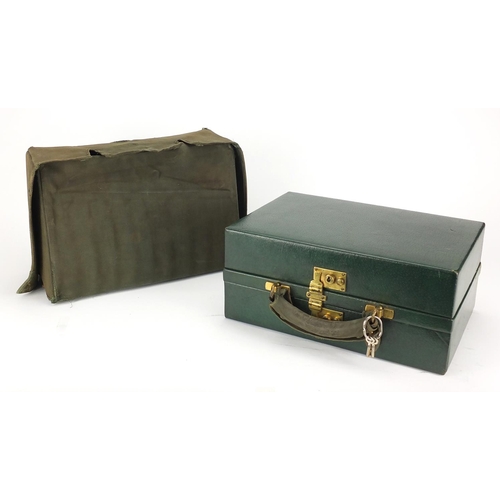 107 - Victorian leather travelling vanity case by Apsrey of London, with protective jacket and silk interi... 